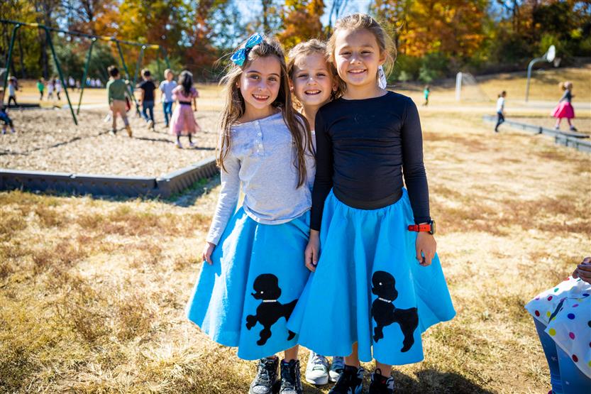 Students dressed in '50s wear smile